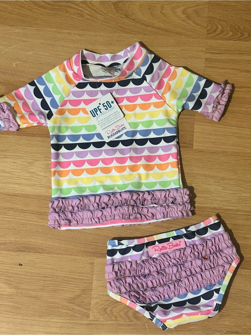 RuffleButts Baby Girls Swimsuit Rainbow Rash Guard Bikini UPF 50+ Size 12-18M